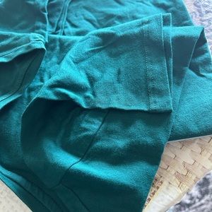 Brand new, never tried on and still in plastic tshirts